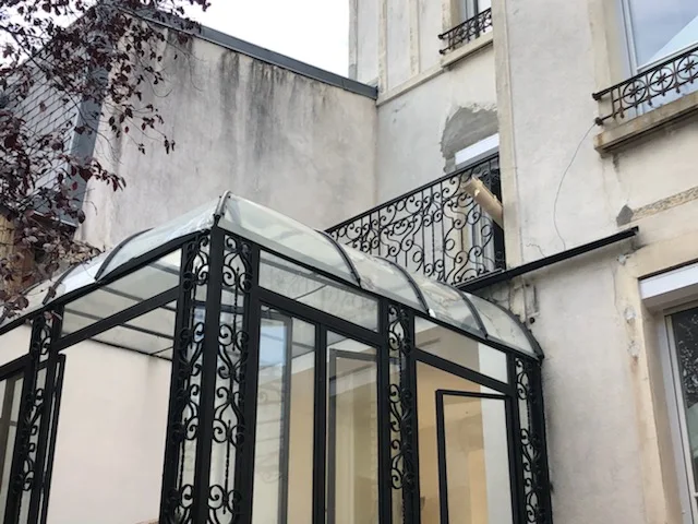 Véranda en verre isolant sur mesure Île-de-France